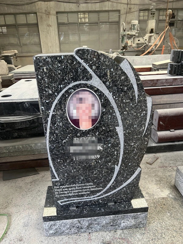 Polished New Emerald Pearl Granite Headstone