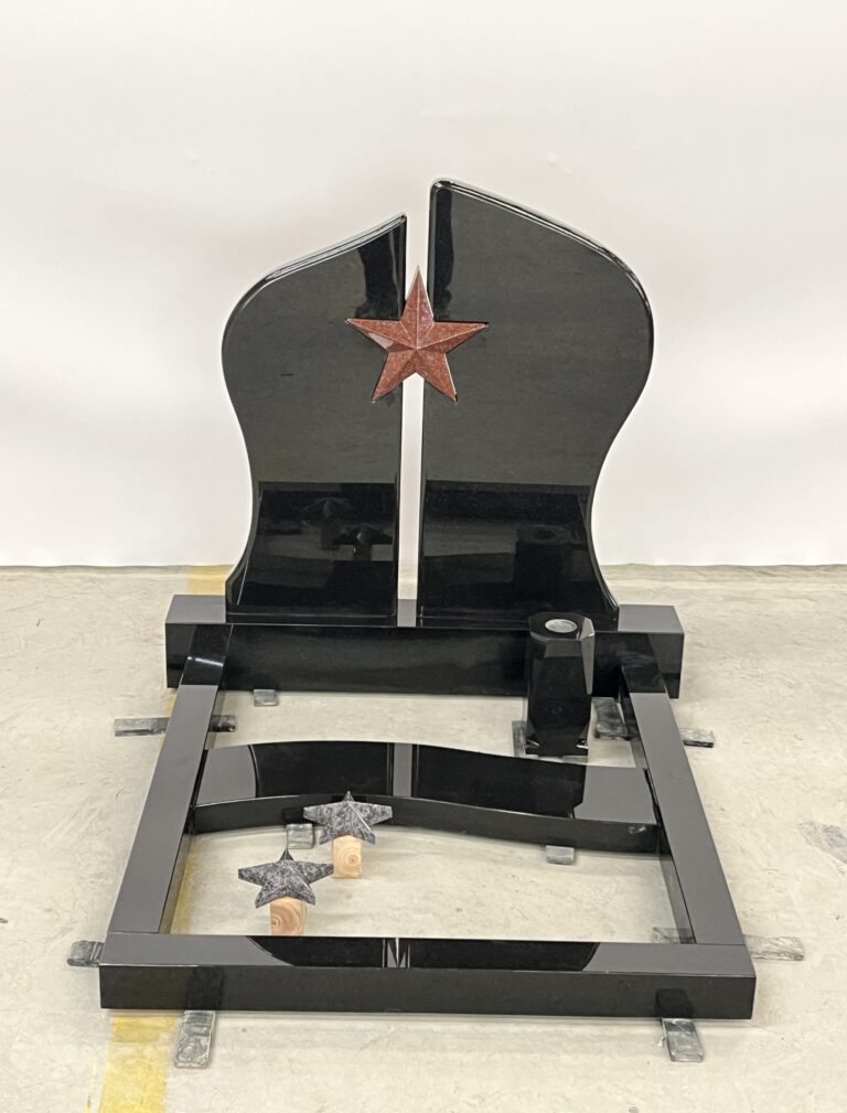 Absolute Black Monument with Carved Star Icon Design