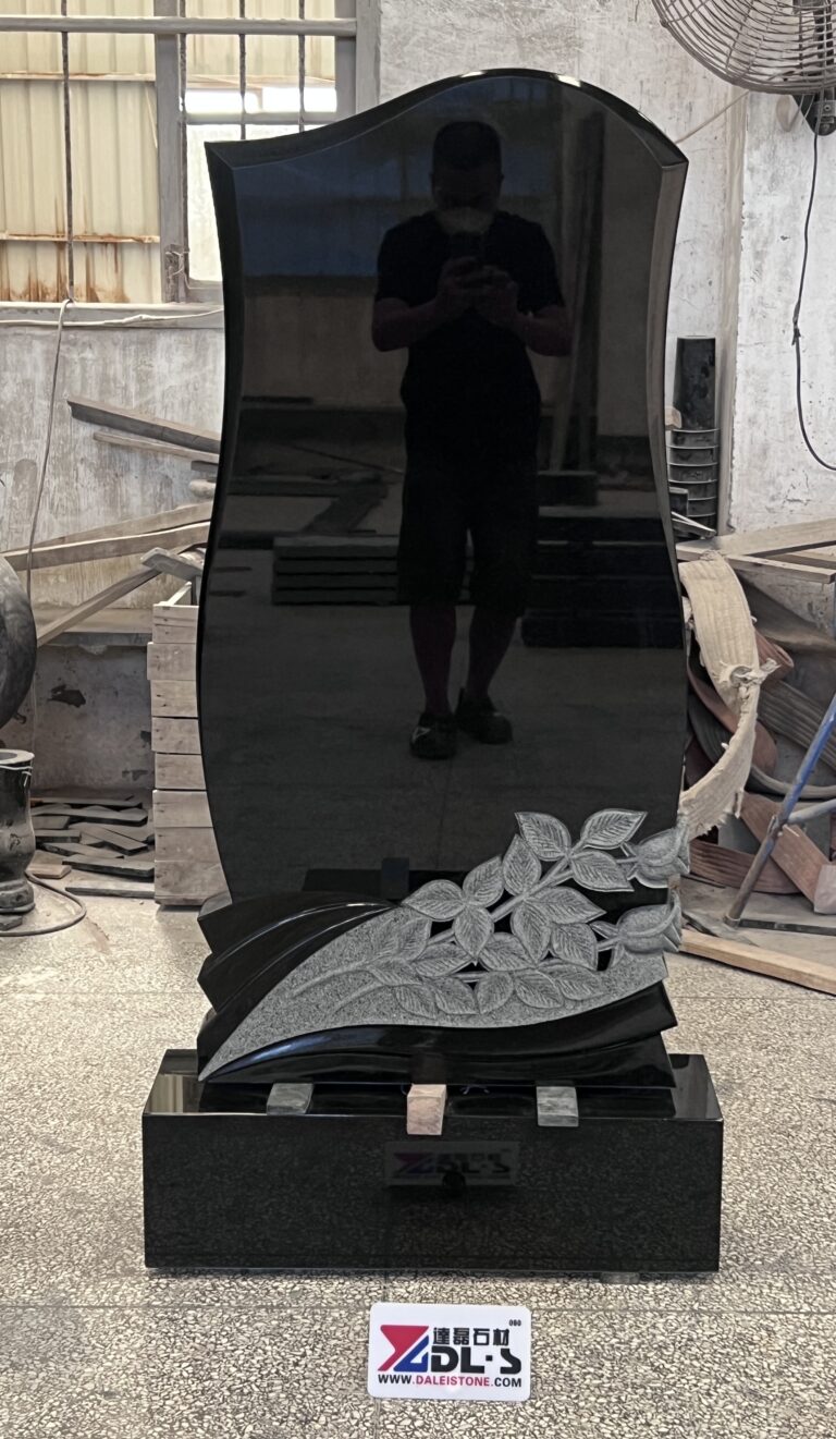 Serp Top Absolute Black Granite Headstone with Hand Carved Rose Design